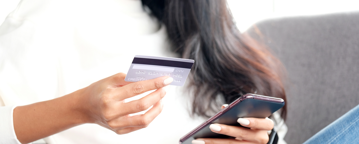 Photo of a woman shopping on her mobile phone