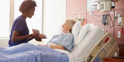 Nurse at patient bedside