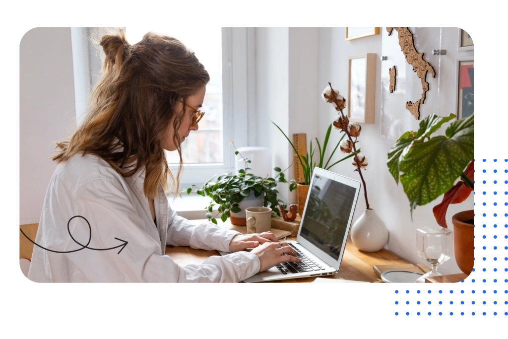 Girl infront of a laptop working