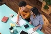 Two women studying