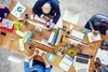 Bird's eye view of a group of UX researchers preparing their next usability test.