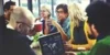 Photo of a group of business professionals sitting around a table