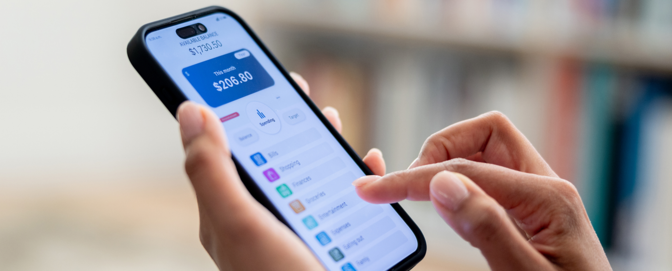 A hero image for Awareness blog post #1 (2X: Banking). A picture of a close up screen of a banking app A hero image for Awareness blog post #1 (2X: Banking). A picture of a close up screen of a banking app