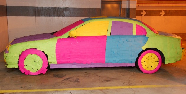 Car covered in Post It notes